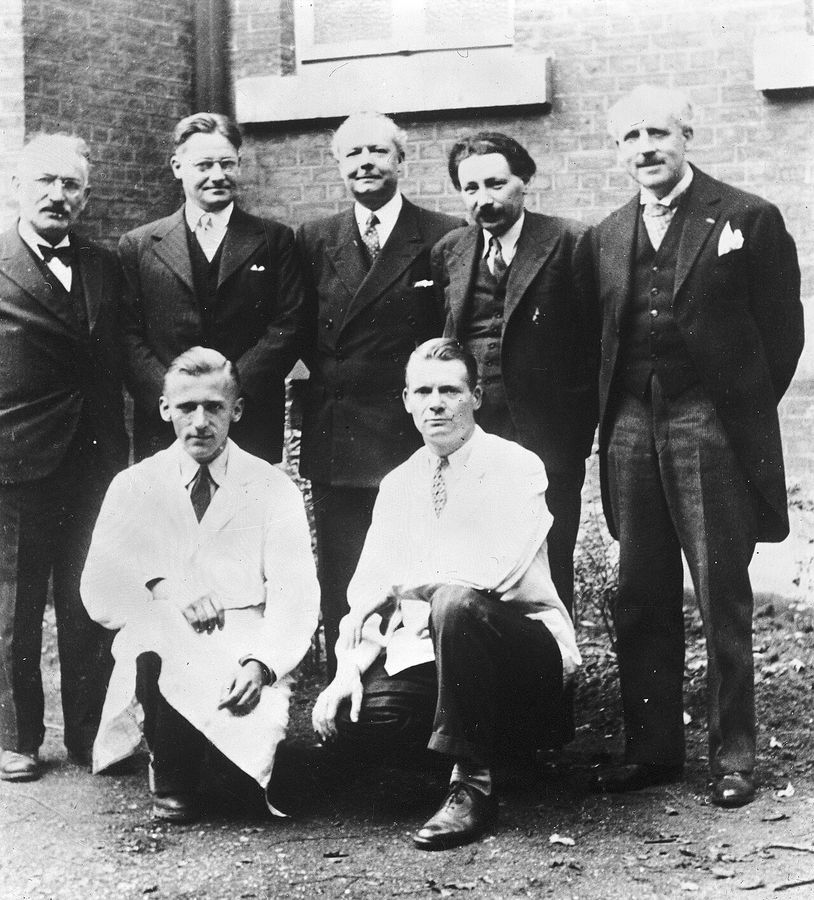 Group portrait including E.B. Chain.